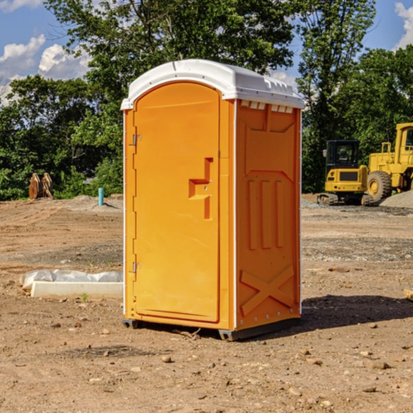 how often are the portable restrooms cleaned and serviced during a rental period in Portage MI